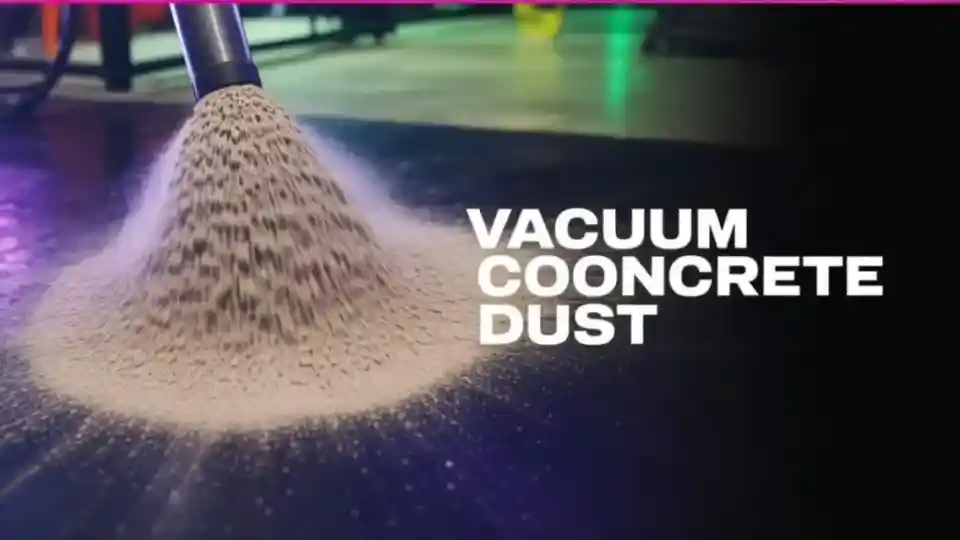 vacuum cleaner removing concrete dust from floor